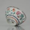 0661 Lovely Amsterdam Bont bowl with a rare scene of of flowers in famille rose