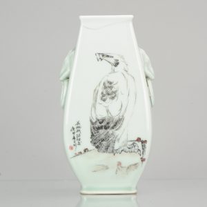 0680 A 20th century carved PRoC vase with Eagle. Engraved porcelain