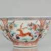 0519 A Chinese classic Kangxi bowl with horses. With a very unsual inside dutch decoration.