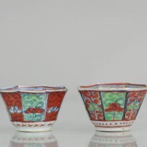 0543 A Chinese tea bowl Kangxi period with flowers. Later 19th clobbering from UK