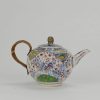 0493. Kangxi period. Cool English Bont teapot. with a restored wooden handle.