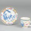 0207 Beautiful tea cup and saucer. Underglaze in blue. Overdecorated in gold, red, green and pink.