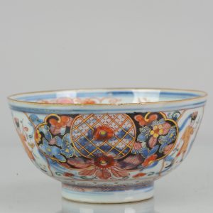 0562 Very unsual Amsterdam Bont bowl with black decoration on a Chine blue and White Fenghuang bowl.