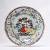 0259. Very rare Amsterdam Bont Grisaille plate. Underglaze in blue with flowers. Overpainted in lots of black, red yellow and blue.