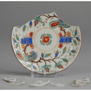 0134 Lovely dutch decorated parrot bowl & saucer. Great tin potted piece..