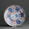 0057 Interesting Blue & White plate with added Imari decoration Late Kangxi or Yongzheng period.