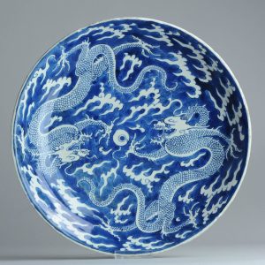 0077 Incredible Dragon Charger, reverse decorated on Blue ground color.