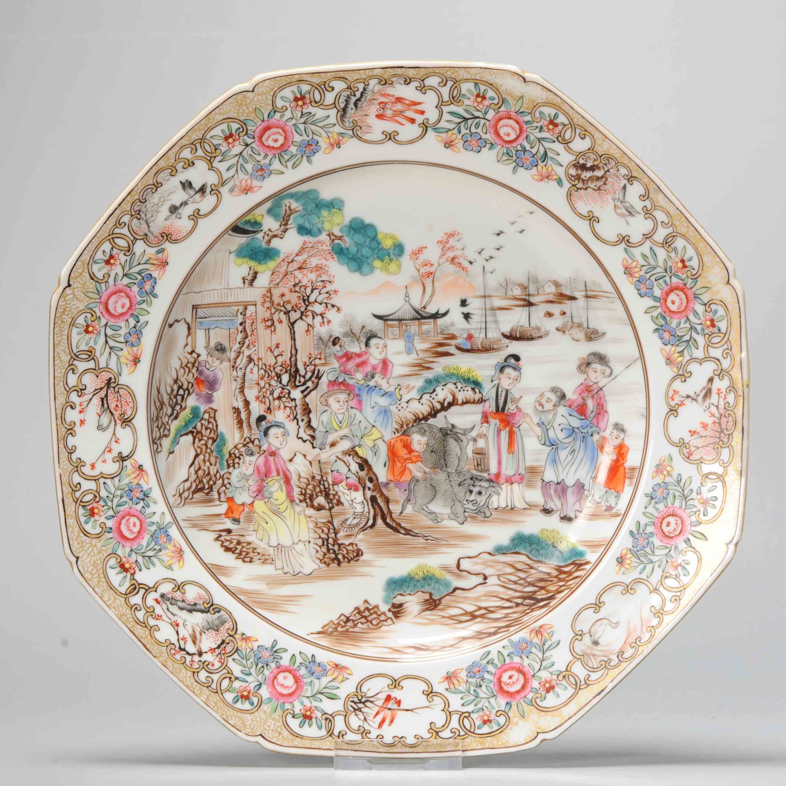 1001 A modern copy of a Qianlong Mandarin Famille Rose plate