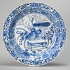 0749 A nice Moulded Kangxi plate with peacock, marked with flower