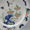 1008 A rare Wucai Kangxi dish With a Garden and Butterfly scene. Marked base - Image 4
