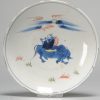 1048 A Chinese porcelain Ming Ko Akae dish with Ox Boy playing flute