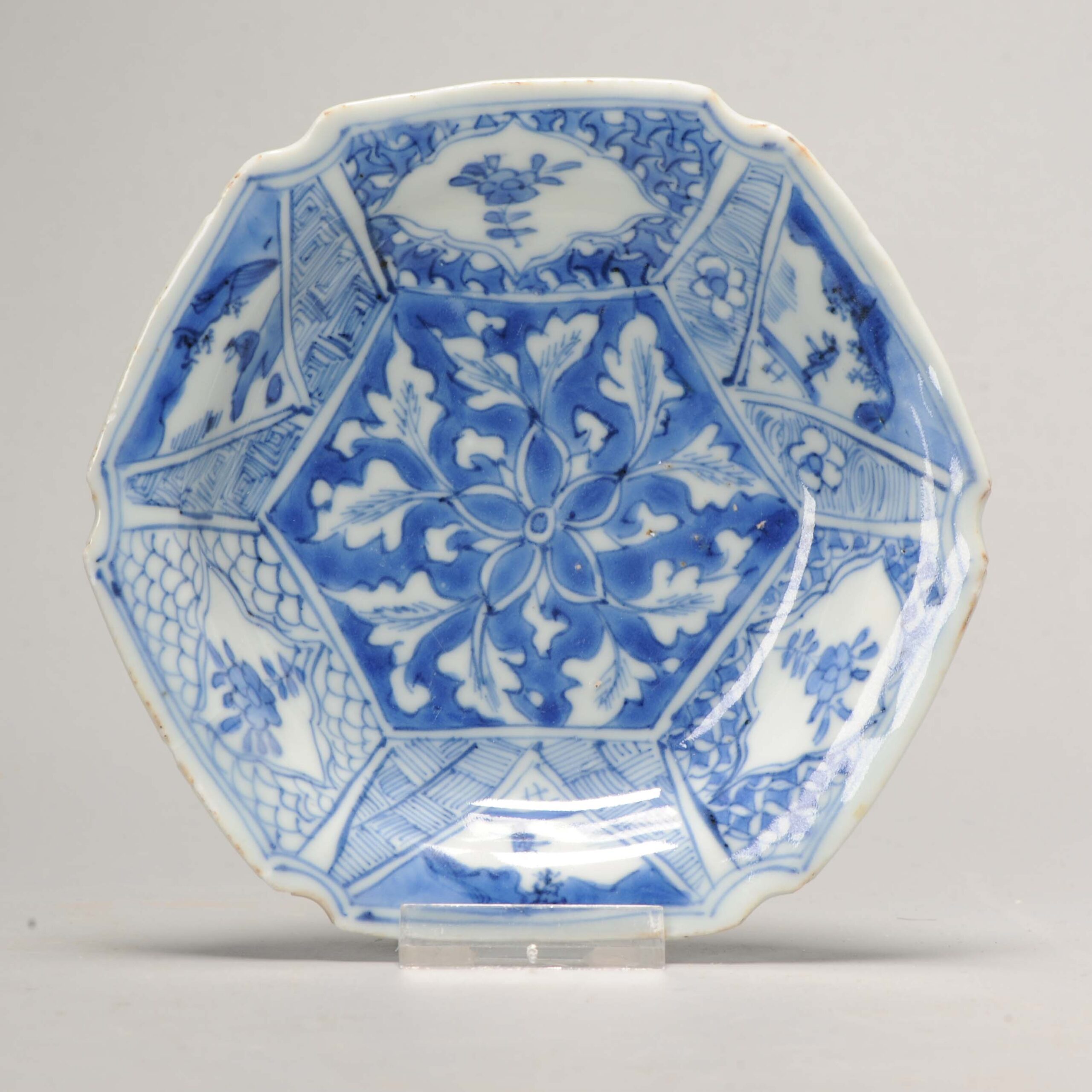 1099 A Chinese porcelain Ming Blue and White Kosometsuke dish with figures and flowers