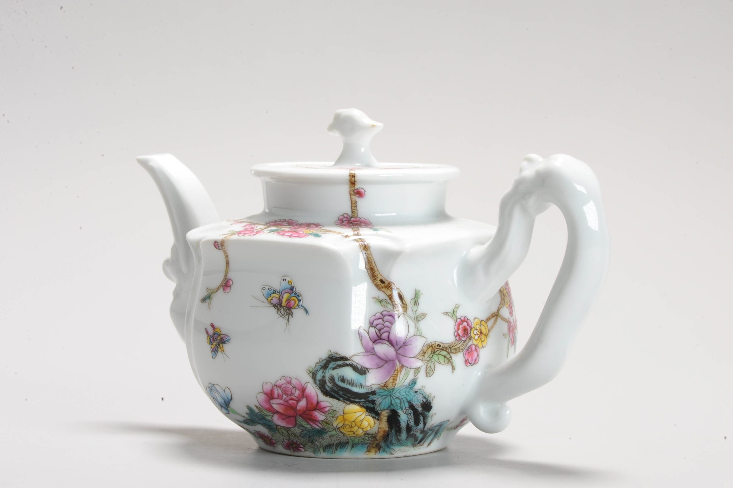 1169 A 20th century PRoC Teapot with FLoral Insect and garden scene