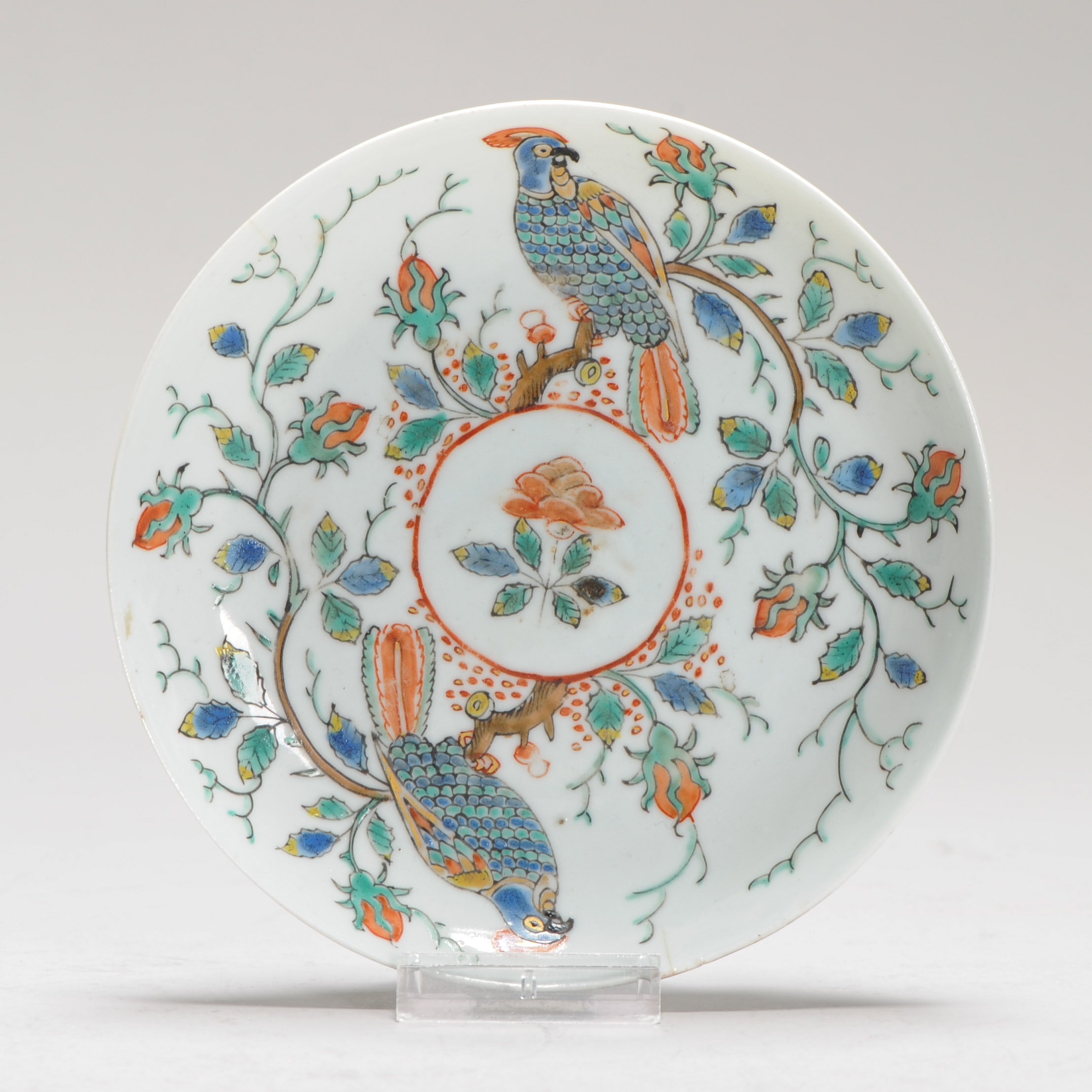 1246 A Lovely Chinese Saucer Dish, decorated with Parrots in Europe on a Chinese blank
