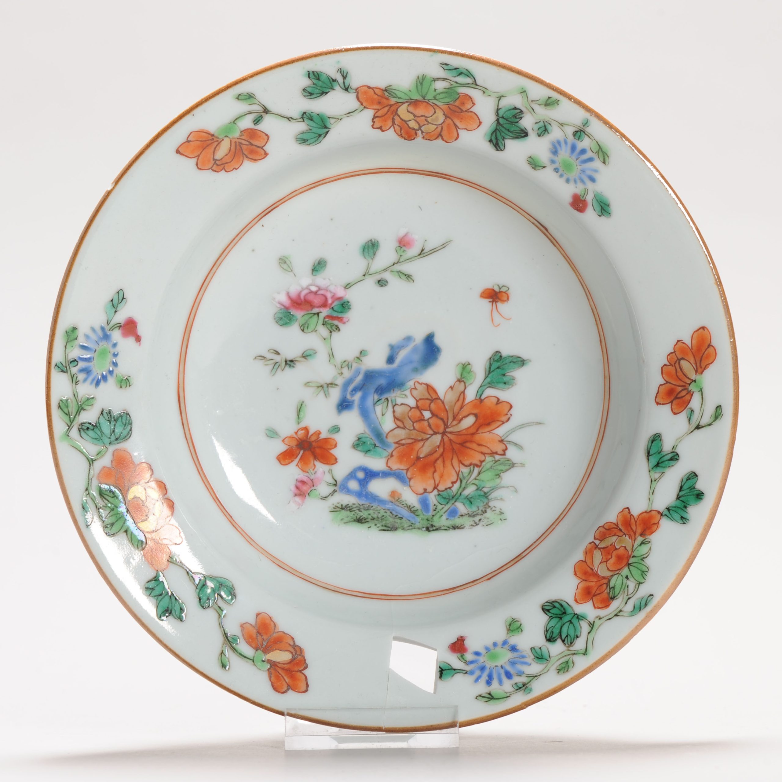 1273 A Famille Rose Small porridge plate with a scene of flowers