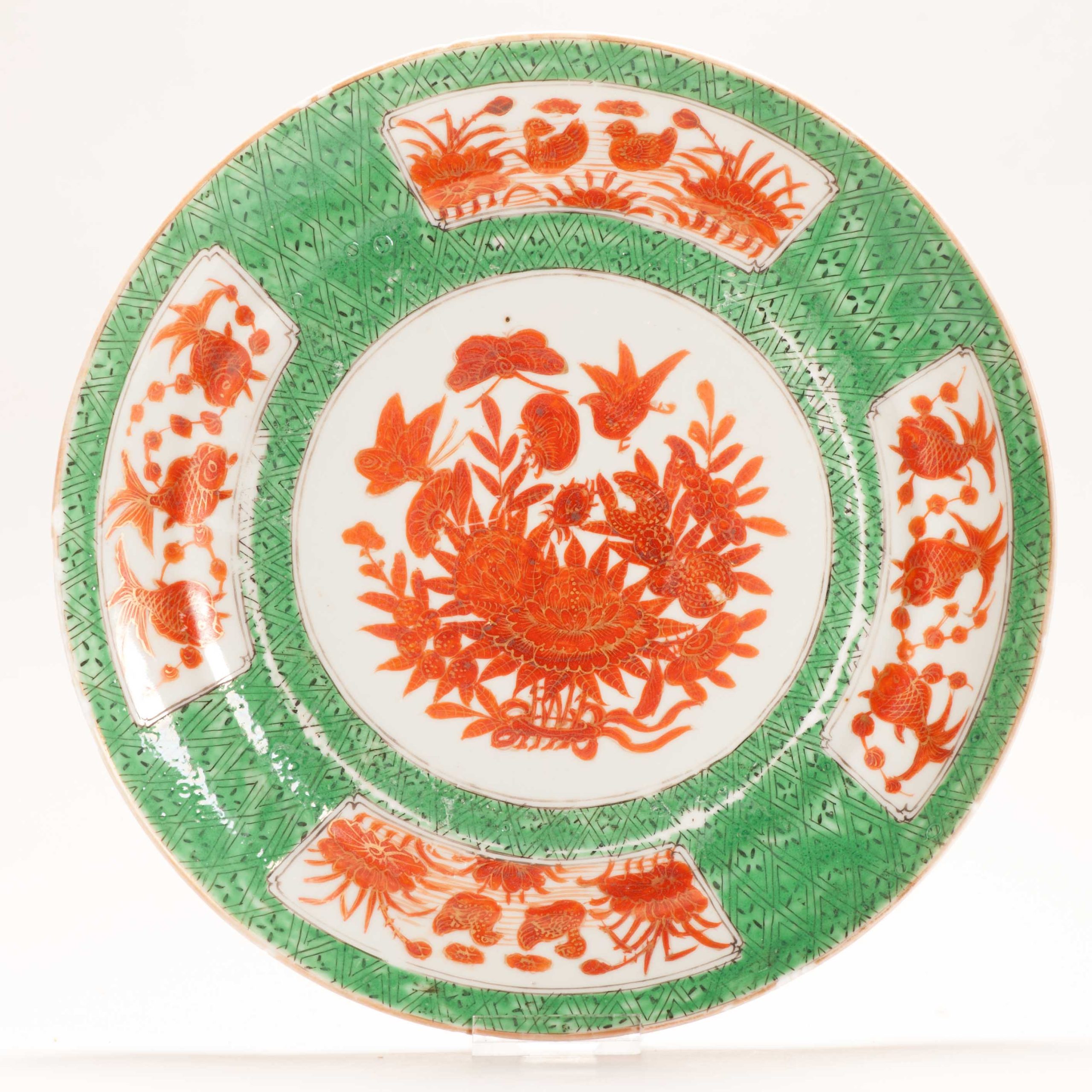 1290  A Cantonese Green and Red Decorated Plate. Odd decoration