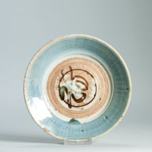 1478 An interesting South Chinese porcelain/Stoneware dish with blue glaze.