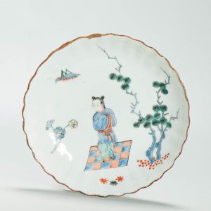 1681 A Chinese Porcelain Kakiemon Style Amsterdam Bont Plate with Figure and Cricket