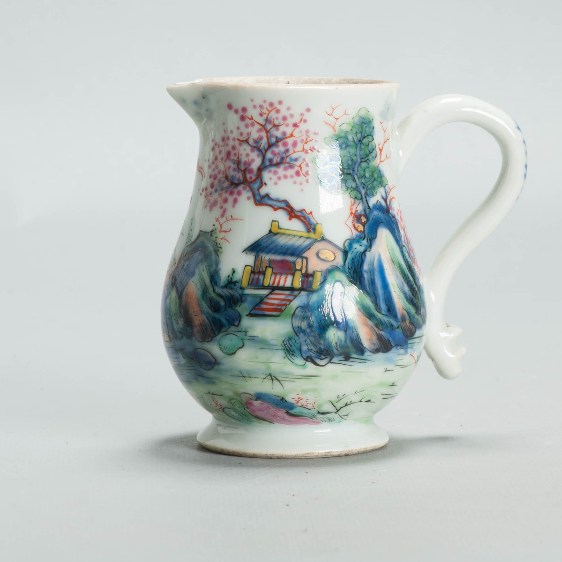 1691 A nice Chinese Creamer in Doucai Colors. Londen Decorated