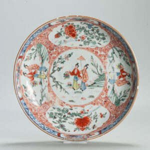 1695 A Very Rare Chinese plate with Anhua underglaze blue and Amsterdam bont dame au parasol