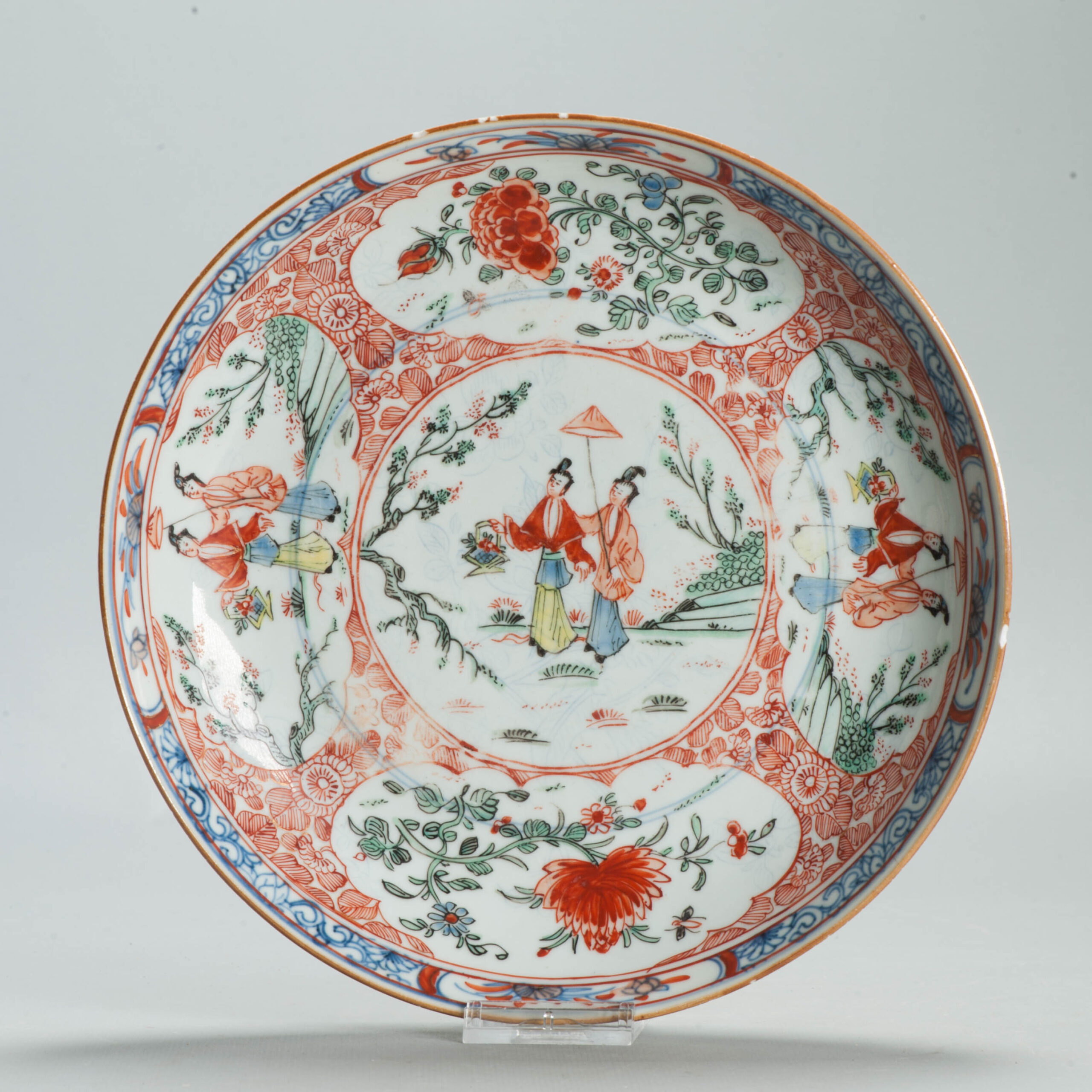 1695 A Very Rare Chinese plate with Anhua underglaze blue and Amsterdam bont dame au parasol
